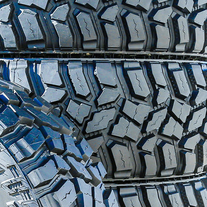 Cooper Discoverer STT Pro Mud Terrain Light Truck Tires 285/75R16 126/123Q E 10 Ply - Set Of 4